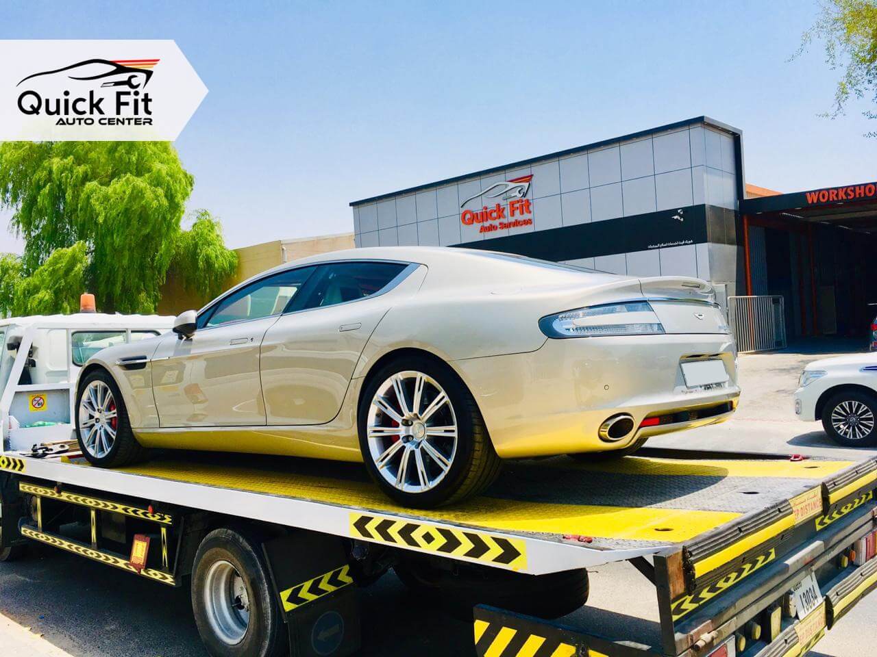 Towing of Aston Martin at Quick Fit Auto Center in Dubai